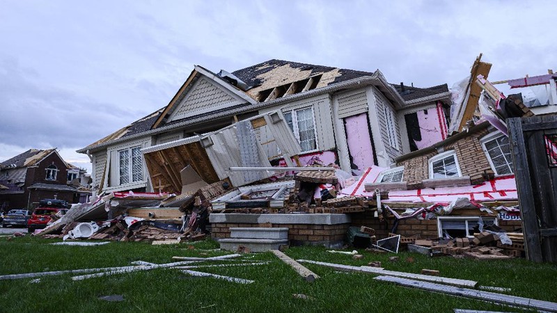 Damage left after a tornado touched down in a neighborhood of Barrie, Ontario, on Thursday, July 15, 2021. (Christopher Katsarov/The Canadian Press via AP)
