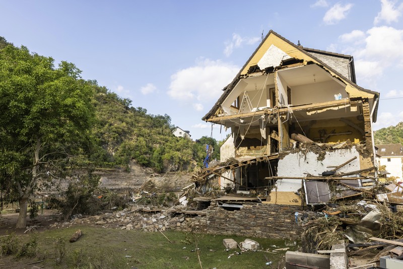 An aerial photo shows destroyed houses in a village as wildfires continue to rage the forests near the Mediterranean coastal town of Manavgat, Antalya, Turkey, Thursday, July 29, 2021. Authorities evacuated homes in southern Turkey as a wildfire fanned by strong winds raged through a forest area near the Mediterranean coastal town of Manavgat. District governor Mustafa Yigit said residents of four neighborhoods were moved out of the fire's path as firefighters worked to control the blaze that broke out Wednesday. It was not immediately clear what caused the fire but authorities said nearby tourist resorts were not affected. (Suat Metin/IHA via AP)
