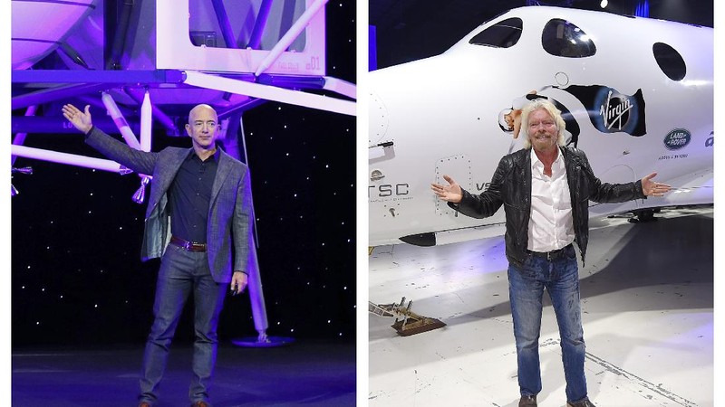 FILE - In this Thursday, May 9, 2019 file phto, Jeff Bezos speaks in front of a model of Blue Origin's Blue Moon lunar lander in Washington. In 2020, NASA Administrator Jim Bridenstine said space is currently a $400 billion market, including satellites. Opening up spaceflight to paying customers, he said, could expand the market to $1 trillion. (AP Photo/Patrick Semansky)