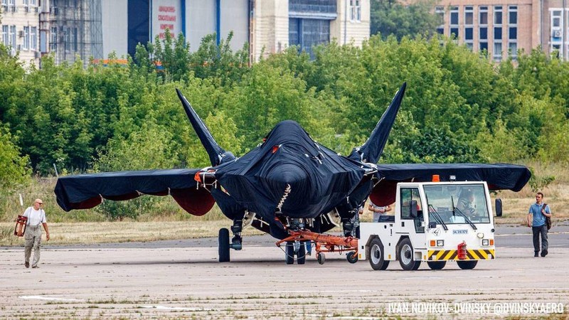 Hidden under tarpaulin, a prospective Russian fighter jet is being towed to a parking spot before its presentation at the Moscow international air show in Zhukovsky outside Moscow, Russia, Thursday, July 15, 2021. Russian aircraft makers say they will present a prospective new fighter jet at a Moscow air show that opens next week. The new warplane hidden under tarpaulin was photographed being towed to a parking spot across the airfield in Zhukovsky outside Moscow. That's where MAKS-2021 International Aviation and Space Salon opens on Tuesday. Russian President Vladimir Putin is set to visit the show’s opening. (AP Photo/Ivan Novikov-Dvinsky)