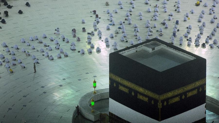 In this photo taken with low shutter speed, Muslim pilgrims circumambulate the Kaaba, the cubic building at the Grand Mosque, at the start the annual hajj pilgrimage, Sunday, July 18, 2021. The pilgrimage to Mecca required once in a lifetime of every Muslim who can afford it and is physically able to make it, used to draw more than 2 million people. But for a second straight year it has been curtailed due to the coronavirus with only vaccinated people in Saudi Arabia able to participate. (AP Photo/Amr Nabil)