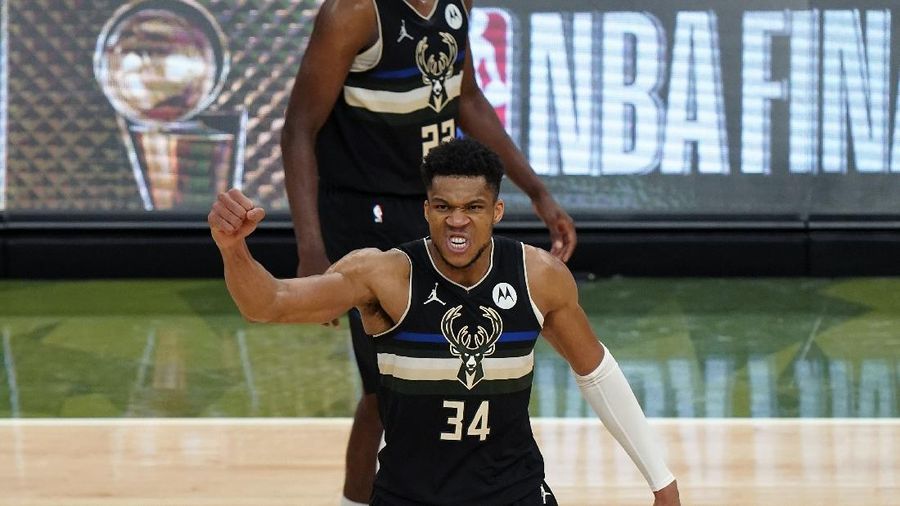 Milwaukee Bucks forward Giannis Antetokounmpo (34) reacts during the second half of Game 6 of basketball's NBA Finals against the Phoenix Suns in Milwaukee, Tuesday, July 20, 2021. (AP Photo/Paul Sancya)