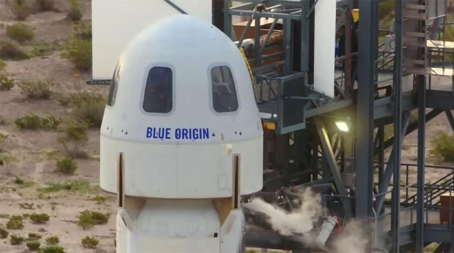 This photo provided by Blue Origin, Blue Origin's New Shepard rocket sits on a spaceport launch pad near Van Horn, Texas, Tuesday, July 20, 2021. The rocket that is scheduled to launch later this morning will carry passengers Jeff Bezos, founder of Amazon and space tourism company Blue Origin, his brother Mark Bezos, Oliver Daemen and Wally Funk. (Blue Origin via AP)