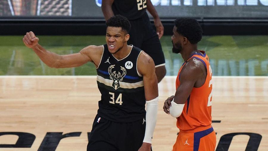 Milwaukee Bucks forward Giannis Antetokounmpo (34) reacts during the second half of Game 6 of basketball's NBA Finals against the Phoenix Suns in Milwaukee, Tuesday, July 20, 2021. (AP Photo/Paul Sancya)