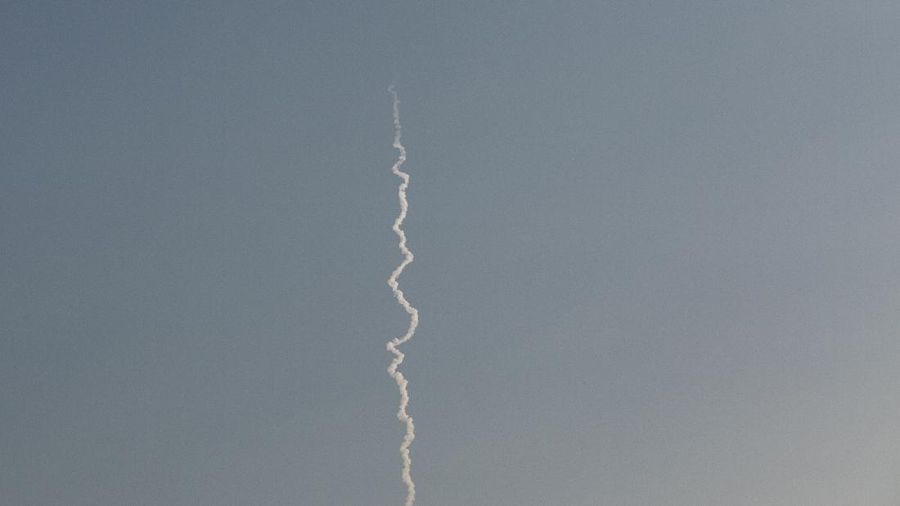 This photo provided by Blue Origin, Blue Origin's New Shepard rocket sits on a spaceport launch pad near Van Horn, Texas, Tuesday, July 20, 2021. The rocket that is scheduled to launch later this morning will carry passengers Jeff Bezos, founder of Amazon and space tourism company Blue Origin, his brother Mark Bezos, Oliver Daemen and Wally Funk. (Blue Origin via AP)