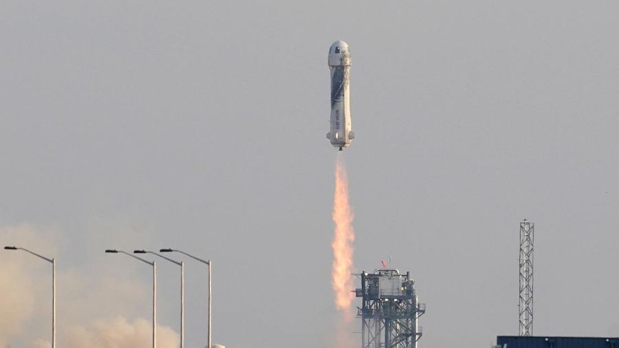 This photo provided by Blue Origin, Blue Origin's New Shepard rocket sits on a spaceport launch pad near Van Horn, Texas, Tuesday, July 20, 2021. The rocket that is scheduled to launch later this morning will carry passengers Jeff Bezos, founder of Amazon and space tourism company Blue Origin, his brother Mark Bezos, Oliver Daemen and Wally Funk. (Blue Origin via AP)