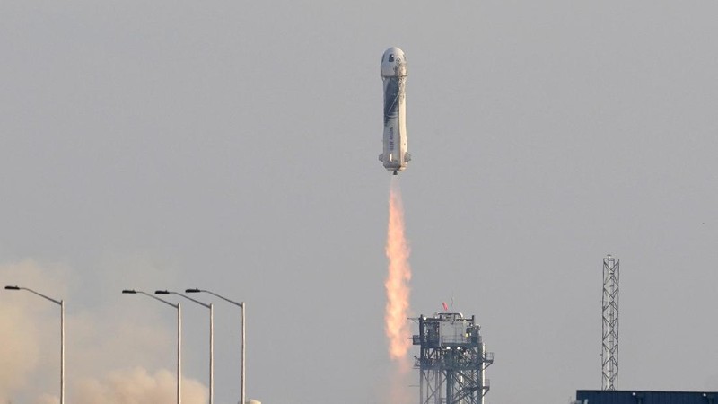 This photo provided by Blue Origin, Blue Origin's New Shepard rocket sits on a spaceport launch pad near Van Horn, Texas, Tuesday, July 20, 2021. The rocket that is scheduled to launch later this morning will carry passengers Jeff Bezos, founder of Amazon and space tourism company Blue Origin, his brother Mark Bezos, Oliver Daemen and Wally Funk. (Blue Origin via AP)