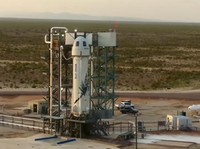 This photo provided by Blue Origin, Blue Origin's New Shepard rocket sits on a spaceport launch pad near Van Horn, Texas, Tuesday, July 20, 2021. The rocket that is scheduled to launch later this morning will carry passengers Jeff Bezos, founder of A