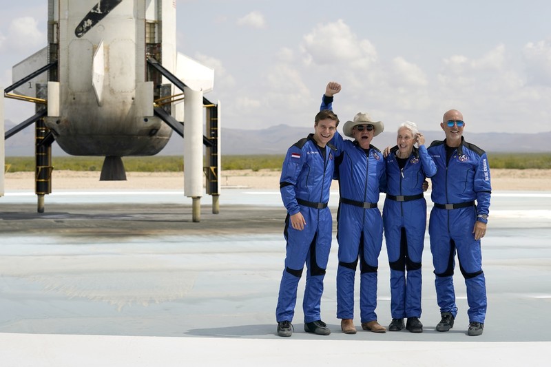 This photo provided by Blue Origin, Blue Origin's New Shepard rocket sits on a spaceport launch pad near Van Horn, Texas, Tuesday, July 20, 2021. The rocket that is scheduled to launch later this morning will carry passengers Jeff Bezos, founder of Amazon and space tourism company Blue Origin, his brother Mark Bezos, Oliver Daemen and Wally Funk. (Blue Origin via AP)