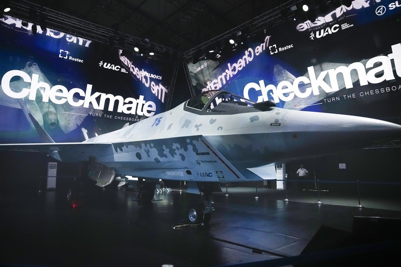 A prototype of Russia's prospective fighter jet is displayed at the MAKS-2021 International Aviation and Space Salon in Zhukovsky outside Zhukovsky, Russia, Tuesday, July 20, 2021. Russia has presented a prototype of a new fighter jet that features stealth capabilities and other advanced characteristics and will be offered to foreign customers. Russian President Vladimir Putin inspected the new warplane displayed at the MAKS-2021 International Aviation and Space Salon. (AP Photo/Alexander Zemlianichenko, Pool)