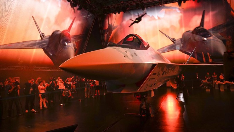 A prototype of Russia's prospective fighter jet is displayed at the MAKS-2021 International Aviation and Space Salon in Zhukovsky outside Zhukovsky, Russia, Tuesday, July 20, 2021. Russia has presented a prototype of a new fighter jet that features stealth capabilities and other advanced characteristics and will be offered to foreign customers. Russian President Vladimir Putin inspected the new warplane displayed at the MAKS-2021 International Aviation and Space Salon. (AP Photo/Alexander Zemlianichenko, Pool)