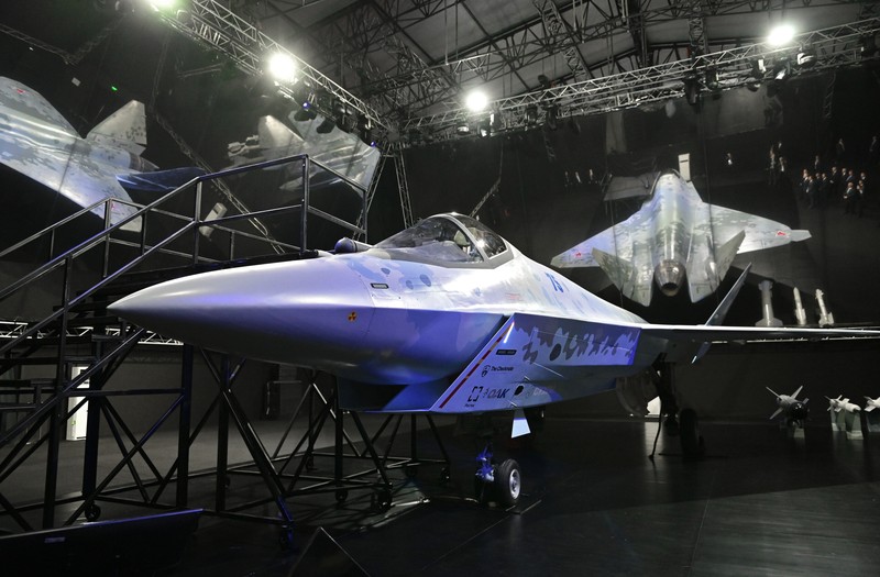A prototype of Russia's prospective fighter jet is displayed at the MAKS-2021 International Aviation and Space Salon in Zhukovsky outside Zhukovsky, Russia, Tuesday, July 20, 2021. Russia has presented a prototype of a new fighter jet that features stealth capabilities and other advanced characteristics and will be offered to foreign customers. Russian President Vladimir Putin inspected the new warplane displayed at the MAKS-2021 International Aviation and Space Salon. (AP Photo/Alexander Zemlianichenko, Pool)