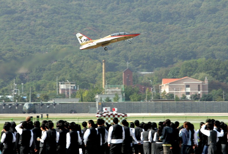 South Korea's first supersonic trainer jet, T-50, performs during Air Power Day at the U.S. airbase in Osan, south of Seoul, South Korea, Sunday, Oct. 12, 2008. The Air Power Day is not only a demonstration of U.S. Air Power, but also the U.S. partnership with the South Korea Air Force. The event was part of an annual ceremony to open the U.S. airbase to South Korean people. (AP Photo/ Lee Jin-man)