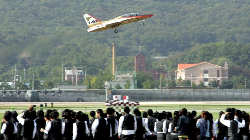 South Korea's first supersonic trainer jet, T-50, performs during Air Power Day at the U.S. airbase in Osan, south of Seoul, South Korea, Sunday, Oct. 12, 2008. The Air Power Day is not only a demonstration of U.S. Air Power, but also the U.S. partnership with the South Korea Air Force. The event was part of an annual ceremony to open the U.S. airbase to South Korean people. (AP Photo/ Lee Jin-man)