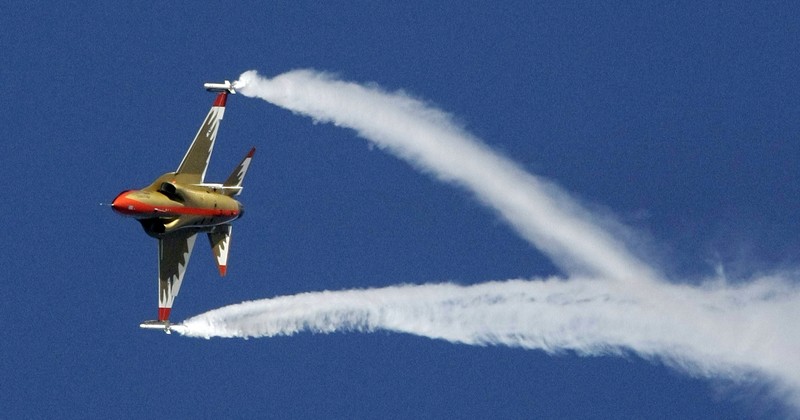 South Korea's first supersonic trainer jet, T-50, performs during Air Power Day at the U.S. airbase in Osan, south of Seoul, South Korea, Sunday, Oct. 12, 2008. The Air Power Day is not only a demonstration of U.S. Air Power, but also the U.S. partnership with the South Korea Air Force. The event was part of an annual ceremony to open the U.S. airbase to South Korean people. (AP Photo/ Lee Jin-man)