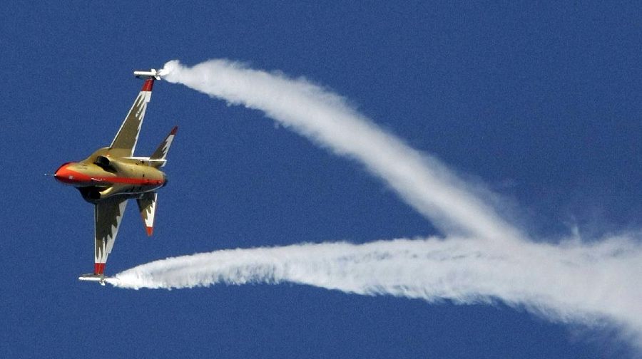 South Korea's first supersonic trainer jet, T-50, performs during Air Power Day at the U.S. airbase in Osan, south of Seoul, South Korea, Sunday, Oct. 12, 2008. The Air Power Day is not only a demonstration of U.S. Air Power, but also the U.S. partnership with the South Korea Air Force. The event was part of an annual ceremony to open the U.S. airbase to South Korean people. (AP Photo/ Lee Jin-man)