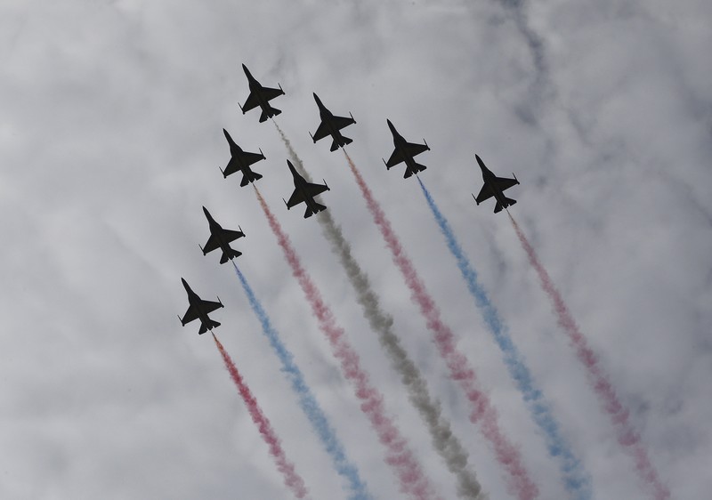 South Korea's first supersonic trainer jet, T-50, performs during Air Power Day at the U.S. airbase in Osan, south of Seoul, South Korea, Sunday, Oct. 12, 2008. The Air Power Day is not only a demonstration of U.S. Air Power, but also the U.S. partnership with the South Korea Air Force. The event was part of an annual ceremony to open the U.S. airbase to South Korean people. (AP Photo/ Lee Jin-man)