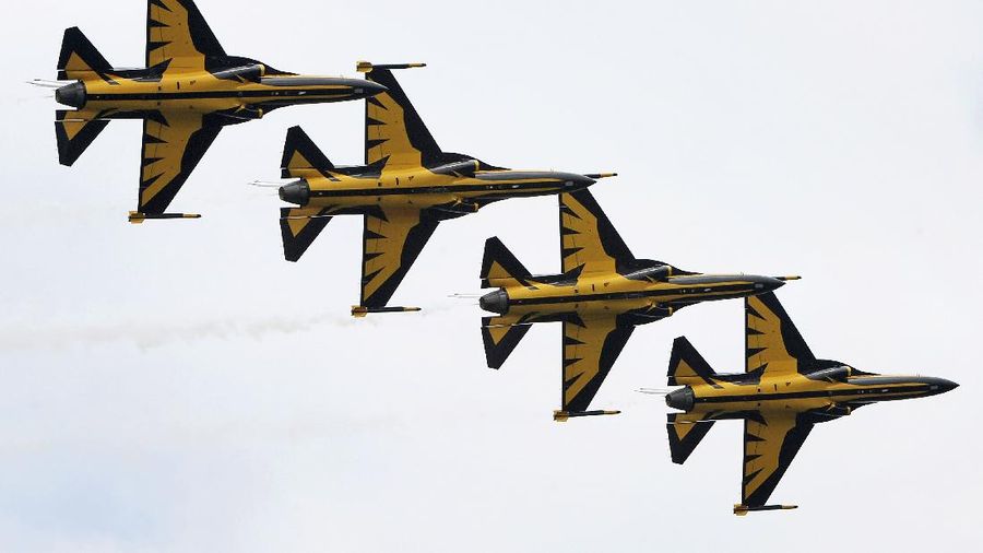 South Korea's first supersonic trainer jet, T-50, performs during Air Power Day at the U.S. airbase in Osan, south of Seoul, South Korea, Sunday, Oct. 12, 2008. The Air Power Day is not only a demonstration of U.S. Air Power, but also the U.S. partnership with the South Korea Air Force. The event was part of an annual ceremony to open the U.S. airbase to South Korean people. (AP Photo/ Lee Jin-man)
