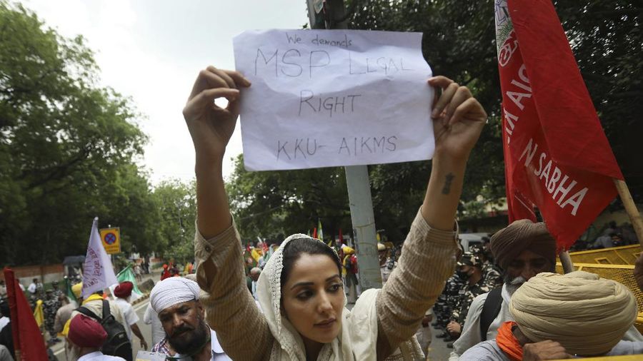 Farmers shout anti government slogans during a protest in New Delhi, India, Thursday, July 22, 2021. More than 200 farmers on Thursday began a protest near India's Parliament to mark eight months of their agitation against new agricultural laws that they say will devastate their income. (AP Photo/Manish Swarup)
