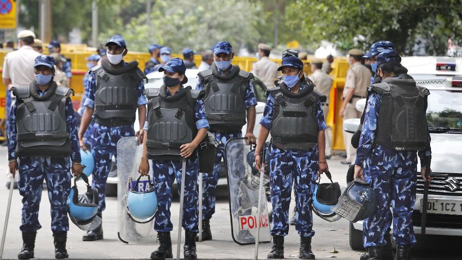Farmers shout anti government slogans during a protest in New Delhi, India, Thursday, July 22, 2021. More than 200 farmers on Thursday began a protest near India's Parliament to mark eight months of their agitation against new agricultural laws that they say will devastate their income. (AP Photo/Manish Swarup)