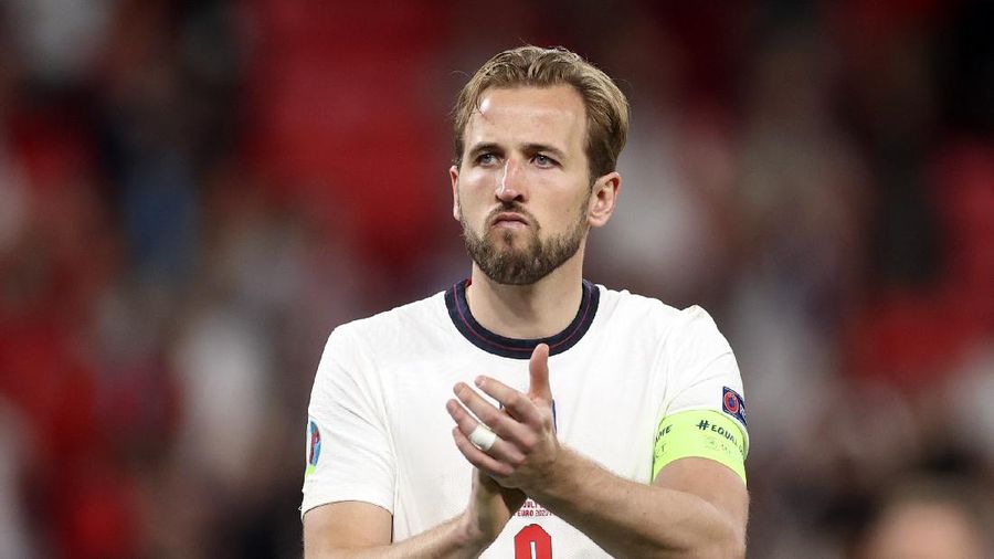 FILE - In this Sunday, July 11, 2021 file photo, England's Harry Kane applauds the fans during the Euro 2020 soccer championship final match between England and Italy at Wembley stadium in London. Harry Kane may want out of Tottenham but new manager Nuno Espirito Santo sent a bold message Friday, July 16: “Harry's our player.” The England captain has indicated he wants a change of scenery after Tottenham's seventh-place finish left it out of the Champions League this season but Nuno said he expects the striker to return. (Carl Recine/Pool Photo via AP, file)