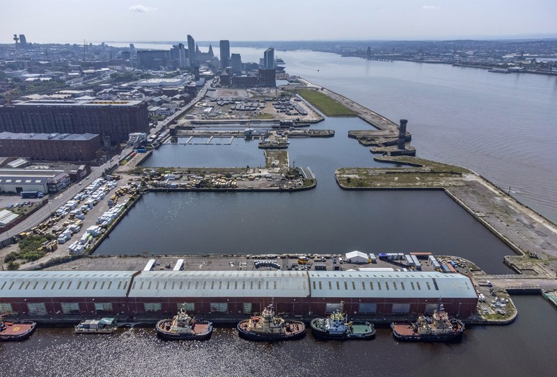 Pemandangan Liverpool Waterfront dari udara, Rabu 21 Juli 2021. (Peter Byrne/PA melalui AP) An aerial view of Liverpool waterfront, which has been removed from the World Heritage List Wednesday July 21, 2021. The UN World Heritage committee found developments including the new Everton soccer stadium threaten the value of the city's waterfront and they have removed the area from the World Heritage List. (Peter Byrne/PA via AP)