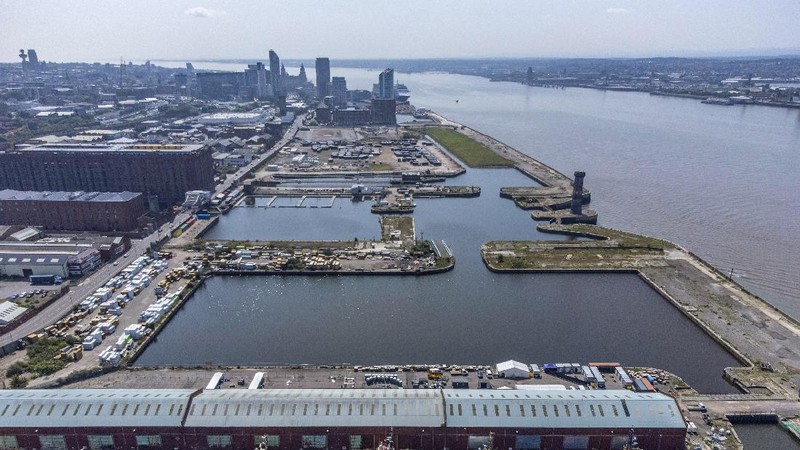 An aerial view of Liverpool waterfront, which has been removed from the World Heritage List Wednesday July 21, 2021.  The UN World Heritage committee found developments including the new Everton soccer stadium threaten the value of the city's waterfront and they have removed the area from the World Heritage List. (Peter Byrne/PA via AP)