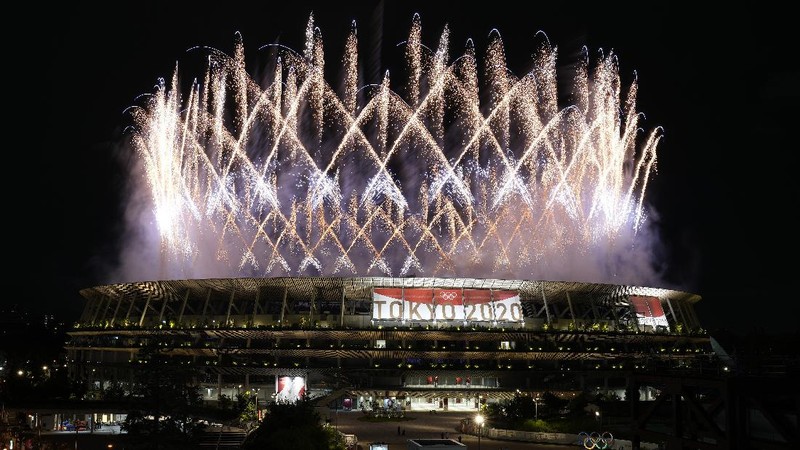 Fireworks illuminate over National Stadium during the opening ceremony of 2020 Tokyo Olympics, Friday, July 23, 2021, in Tokyo. (AP Photo/Kiichiro Sato)