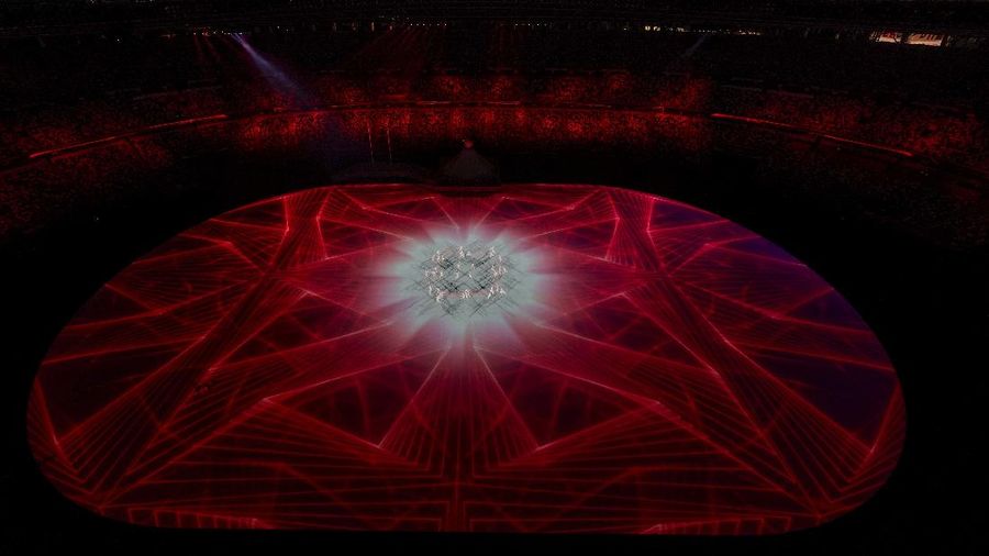 Fireworks illuminate over National Stadium during the opening ceremony of 2020 Tokyo Olympics, Friday, July 23, 2021, in Tokyo. (AP Photo/Kiichiro Sato)