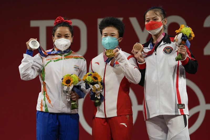 Windy Cantika Aisah menyumbang medali perunggu untuk kontingen Indonesia di Olimpiade Tokyo 2020. (AP/Luca Bruno) Windy Cantika Aisah menyumbang medali perunggu untuk kontingen Indonesia di Olimpiade Tokyo 2020. (AP/Luca Bruno)