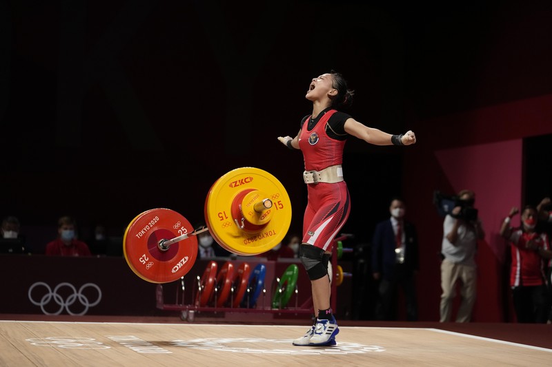 Windy Cantika Aisah menyumbang medali perunggu untuk kontingen Indonesia di Olimpiade Tokyo 2020. (AP/Luca Bruno) Windy Cantika Aisah menyumbang medali perunggu untuk kontingen Indonesia di Olimpiade Tokyo 2020. (AP/Luca Bruno)