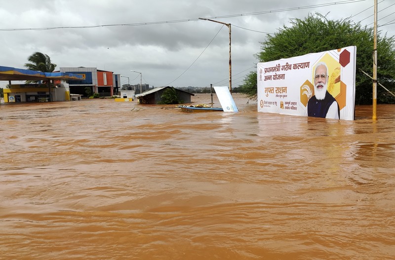 People stranded in flood waters are rescued Kolhapur in western Maharashtra state, India, Saturday, July 24, 2021. Officials say landslides and flooding triggered by heavy monsoon rain have killed more than 100 people in western India. More than 1,000 people trapped by floodwaters have been rescued. (AP Photo)