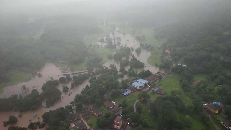 People stranded in flood waters are rescued Kolhapur in western Maharashtra state, India, Saturday, July 24, 2021. Officials say landslides and flooding triggered by heavy monsoon rain have killed more than 100 people in western India. More than 1,000 people trapped by floodwaters have been rescued. (AP Photo)