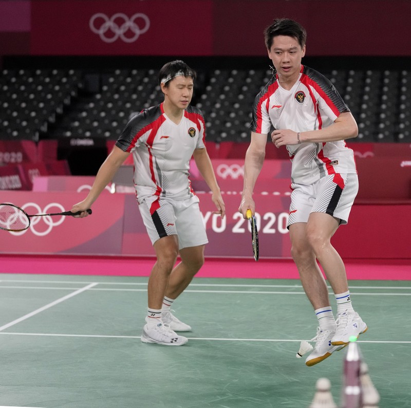 Kevin Sanjaya Sukamuljo dan Marcus Fernaldi Gideon di Olimpiade Tokyo 2020. (AP/Dita Alangkara) Kevin Sanjaya Sukamuljo dan Marcus Fernaldi Gideon di Olimpiade Tokyo 2020. (AP/Dita Alangkara)