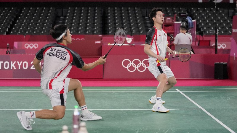 Kevin Sanjaya Sukamuljo dan Marcus Fernaldi Gideon di Olimpiade Tokyo 2020. (AP/Dita Alangkara)