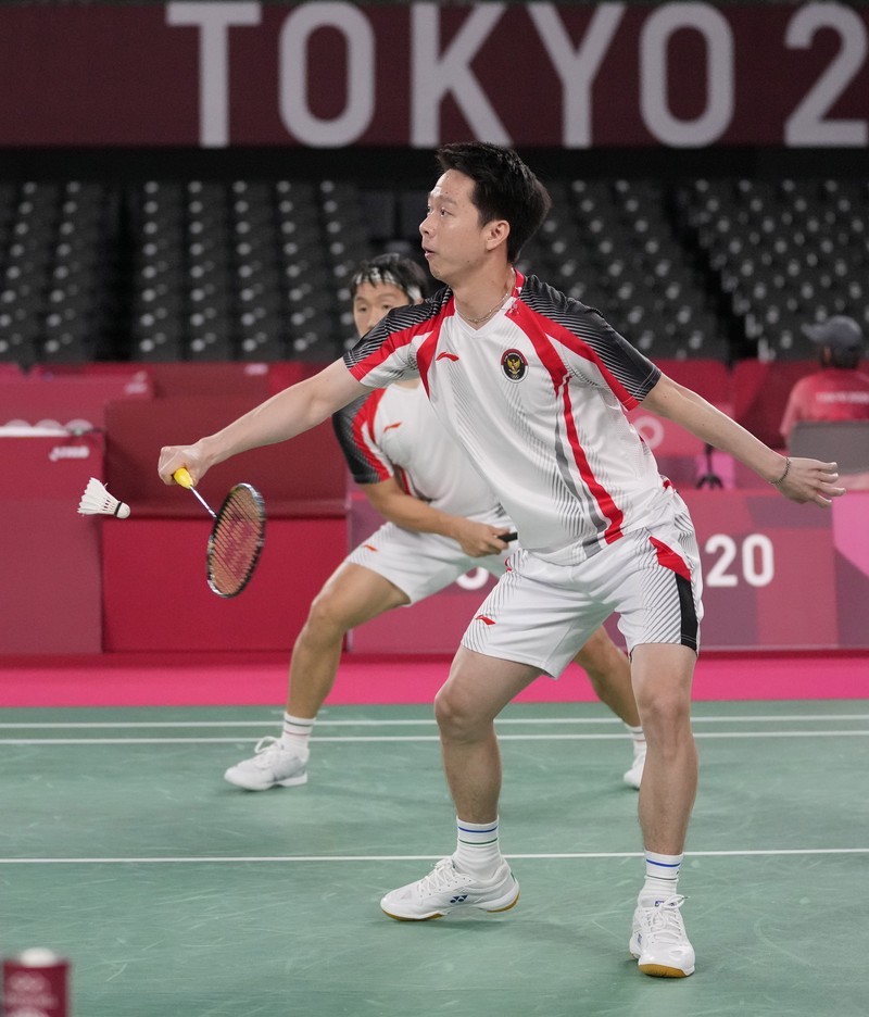 Kevin Sanjaya Sukamuljo dan Marcus Fernaldi Gideon di Olimpiade Tokyo 2020. (AP/Dita Alangkara) Kevin Sanjaya Sukamuljo dan Marcus Fernaldi Gideon di Olimpiade Tokyo 2020. (AP/Dita Alangkara)