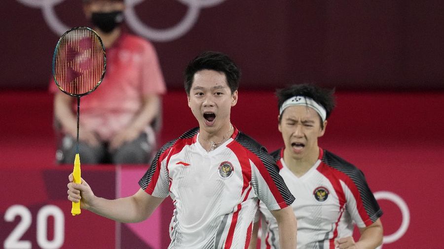 Kevin Sanjaya Sukamuljo dan Marcus Fernaldi Gideon di Olimpiade Tokyo 2020. (AP/Markus Schreiber) Kevin Sanjaya Sukamuljo dan Marcus Fernaldi Gideon di Olimpiade Tokyo 2020. (AP/Markus Schreiber)