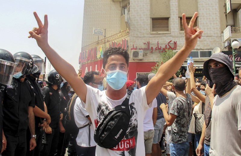 Tunisia ricuh saat penangan pandemi Covid-19. (AP/Hassene Dridi) Tunisia ricuh saat penangan pandemi Covid-19. (AP/Hassene Dridi)