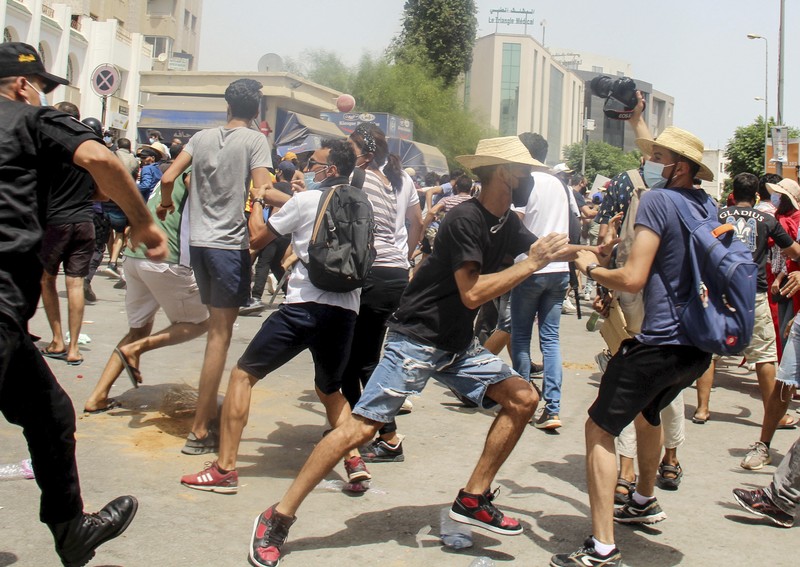 Tunisia ricuh saat penangan pandemi Covid-19. (AP/Hassene Dridi) Tunisia ricuh saat penangan pandemi Covid-19. (AP/Hassene Dridi)