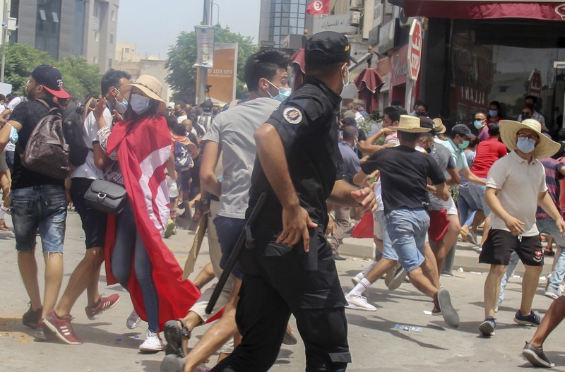 Tunisia ricuh saat penangan pandemi Covid-19. (AP/Hassene Dridi) Tunisia ricuh saat penangan pandemi Covid-19. (AP/Hassene Dridi)