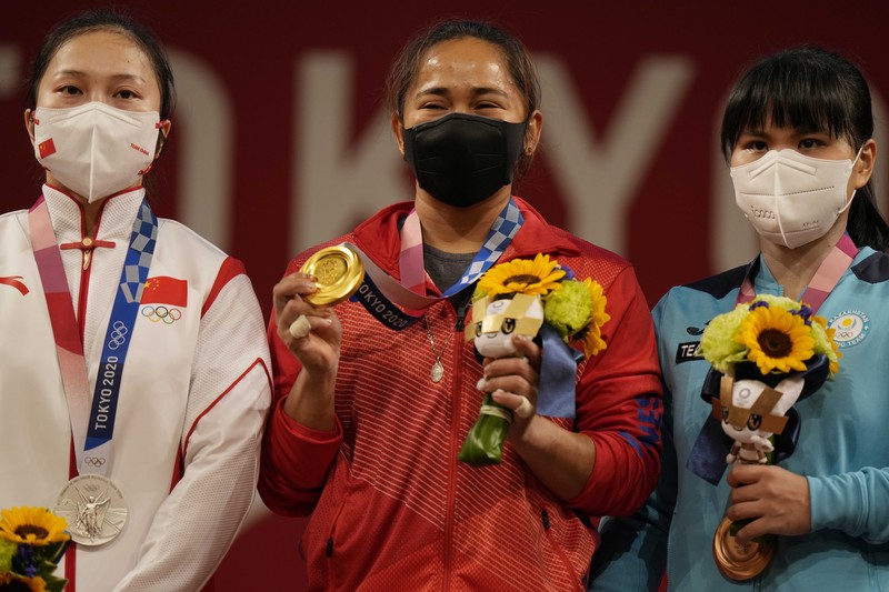 Emas pertama Filipina di ajang Olimpiade disumbangkan oleh lifter, Hidilyn Diaz. (AP/Luca Bruno) Emas pertama Filipina di ajang Olimpiade disumbangkan oleh lifter, Hidilyn Diaz. (AP/Luca Bruno)