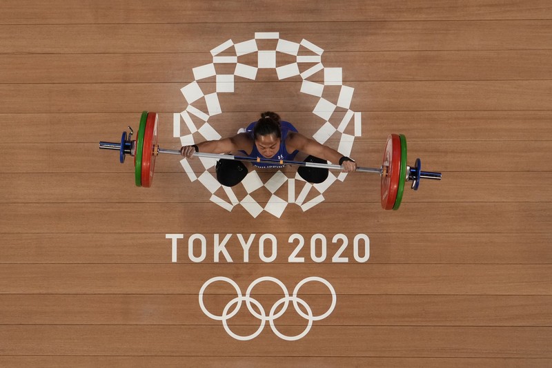 Emas pertama Filipina di ajang Olimpiade disumbangkan oleh lifter, Hidilyn Diaz. (AP/Luca Bruno) Emas pertama Filipina di ajang Olimpiade disumbangkan oleh lifter, Hidilyn Diaz. (AP/Luca Bruno)