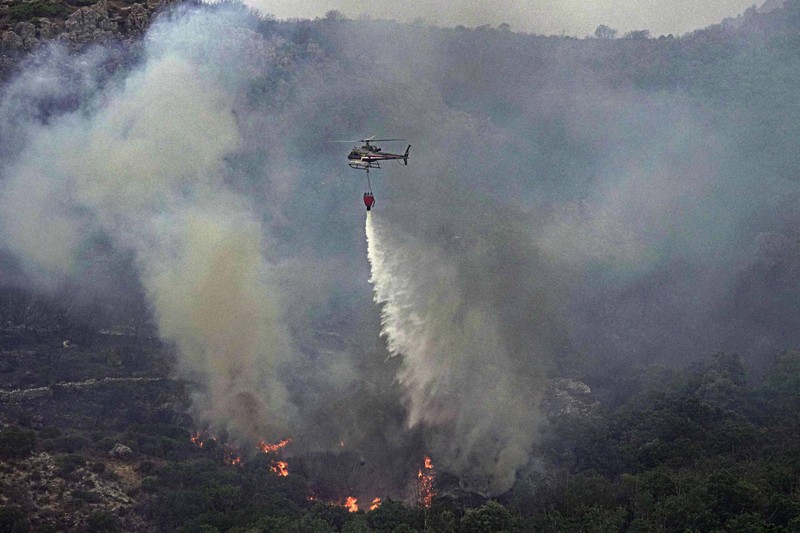 Kebakaran dipedesaan di Cuglieri, Sardinia, Italia. (AP/Alessandro Tocco)