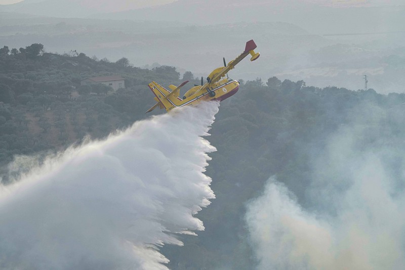 Kebakaran dipedesaan di Cuglieri, Sardinia, Italia. (AP/Alessandro Tocco) Kebakaran dipedesaan di Cuglieri, Sardinia, Italia. (AP/Alessandro Tocco)