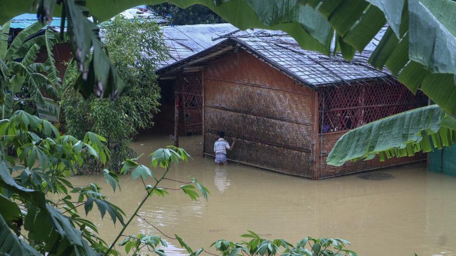 A view of inundated shelters following heavy rains at the Rohingya refugee camp in Kutupalong, Bangladesh, Wednesday, July 28, 2021. Days of heavy rains have brought thousands of shelters in various Rohingya refugee camps in Southern Bangladesh under water, rendering thousands of refugees homeless. (AP Photo/ Shafiqur Rahman)