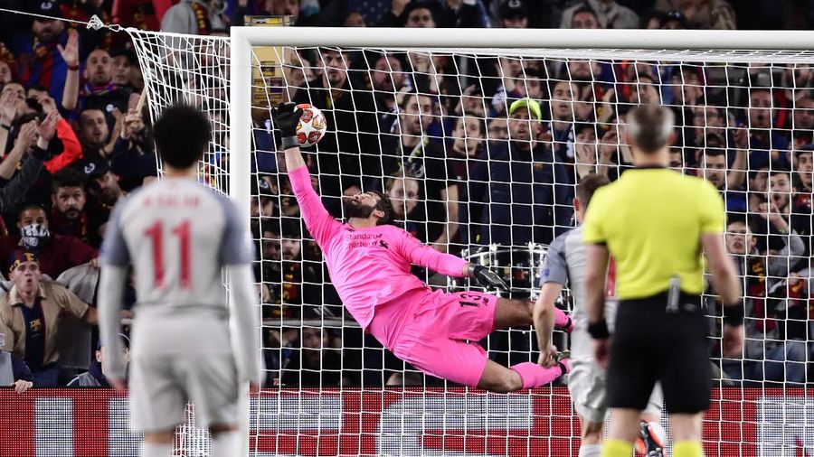 In this combination of six pictures FC Barcelona forward Lionel Messi is seen dashing from his own half past Getafe players before rounding goalkeeper Luis Garcia and scoring from a narrow angle in the 29th minute at the Camp Nou stadium in Barcelona, Spain, Wednesday, April 18, 2007. Messi has drawn further comparisons with Diego Maradona by scoring a near replica of one of the former Argentina captain's most famous goals. Messi emulated Maradona's winner against England in the 1986 World Cup quarterfinals in scoring Barcelona's second goal in a 5-2 win over Getafe in the Copa del Rey semifinals. (AP Photos/Manu Fernandez)