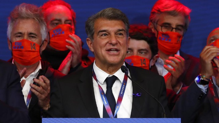 FILE - In this Sunday, March 7, 2021 file photo, Joan Laporta celebrates his victory after elections at the Camp Nou stadium in Barcelona, Spain. Barcelona president Joan Laporta maintained his support for the Super League on Thursday April 22, 2021, despite the quick exit of 10 of the 12 founding clubs in the breakaway competition. (AP Photo/Joan Monfort, File)