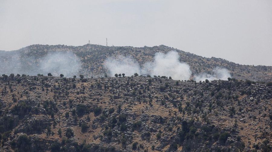 Smoke rise from Israeli shelling near the southern Lebanese village of Kfar Shouba, after Hezbollah fired rockets near an Israeli positions the Golan Heights, Friday, Aug. 6, 2021. The militant Hezbollah group said it fired a barrage of rockets near Israeli positions close to the Lebanese border on Friday, calling it retaliation for Israeli airstrikes on southern Lebanon a day earlier. (AP Photo/Mohammed Zaatari)