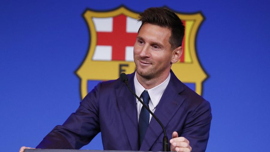 Lionel Messi smiles at the end of a press conference at the Camp Nou stadium in Barcelona, Spain, Sunday, Aug. 8, 2021. FC Barcelona had previously announced the negotiations with Lionel Messi had ended and that Messi would be leaving the club. (AP Photo/Joan Monfort)