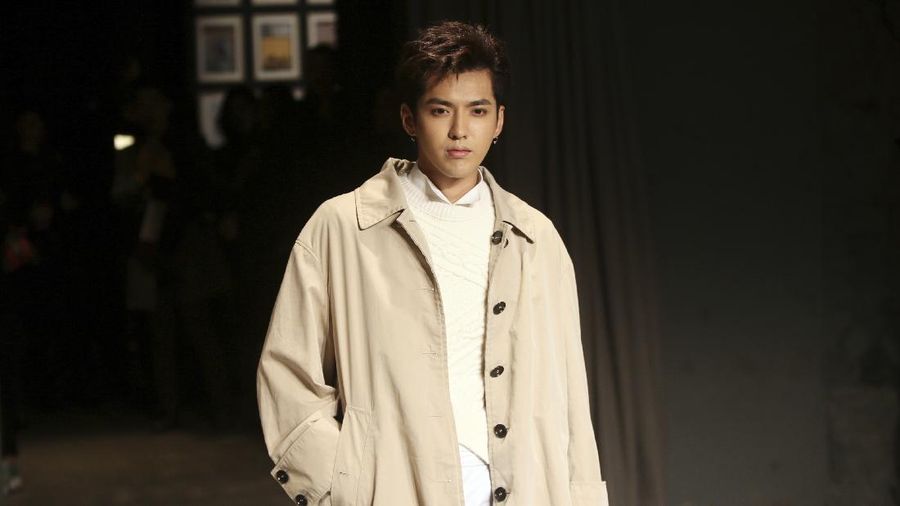 Chinese actor Kris Wu poses for photographers upon arrival at Burberry's Autumn/Winter 2017 fashion show, part of London Fashion Week in London, Monday, Feb. 20, 2017. (Photo by Joel Ryan/Invision/AP)